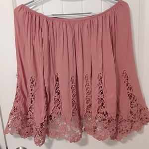 Pastel pink tube top with flared sleeves